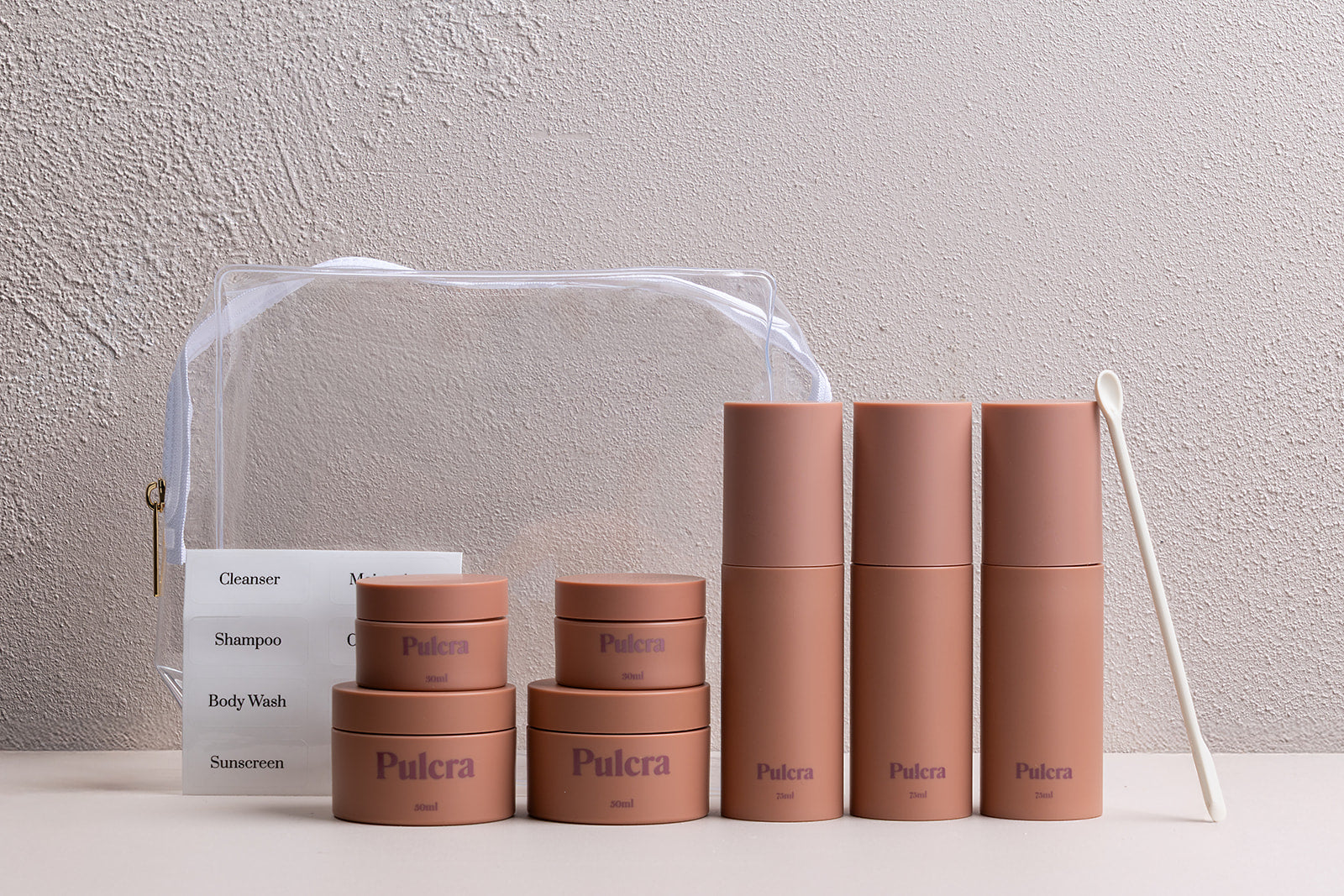 Carry on approved refillable travel containers. Checked luggage refillable travel set for beauty products. Refillable travel set in chocolate. Refillable travel set for suitcase or luggage. 