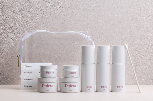 Premium sustainable refillable travel set with reusable bottles and jars for beauty products. 