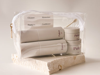 Premium refillable travel set carry-on approved bottles and jars. TSA approved reusable travel containers for cosmetics and beauty products. Leak-proof reusable design. Refillable Travel Set in colour milk.