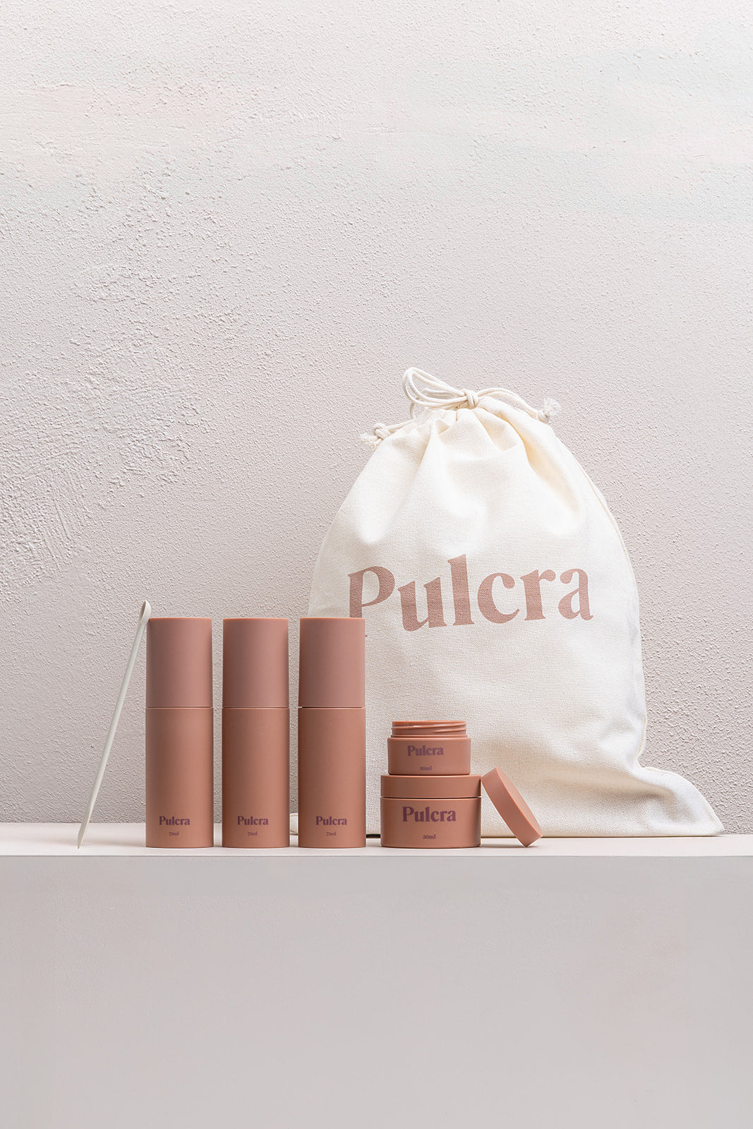 Premium refillable travel set carry-on approved bottles and jars. TSA approved reusable travel containers for cosmetics and beauty products. Leak-proof reusable design. Refillable Travel Set in Chocolate. 