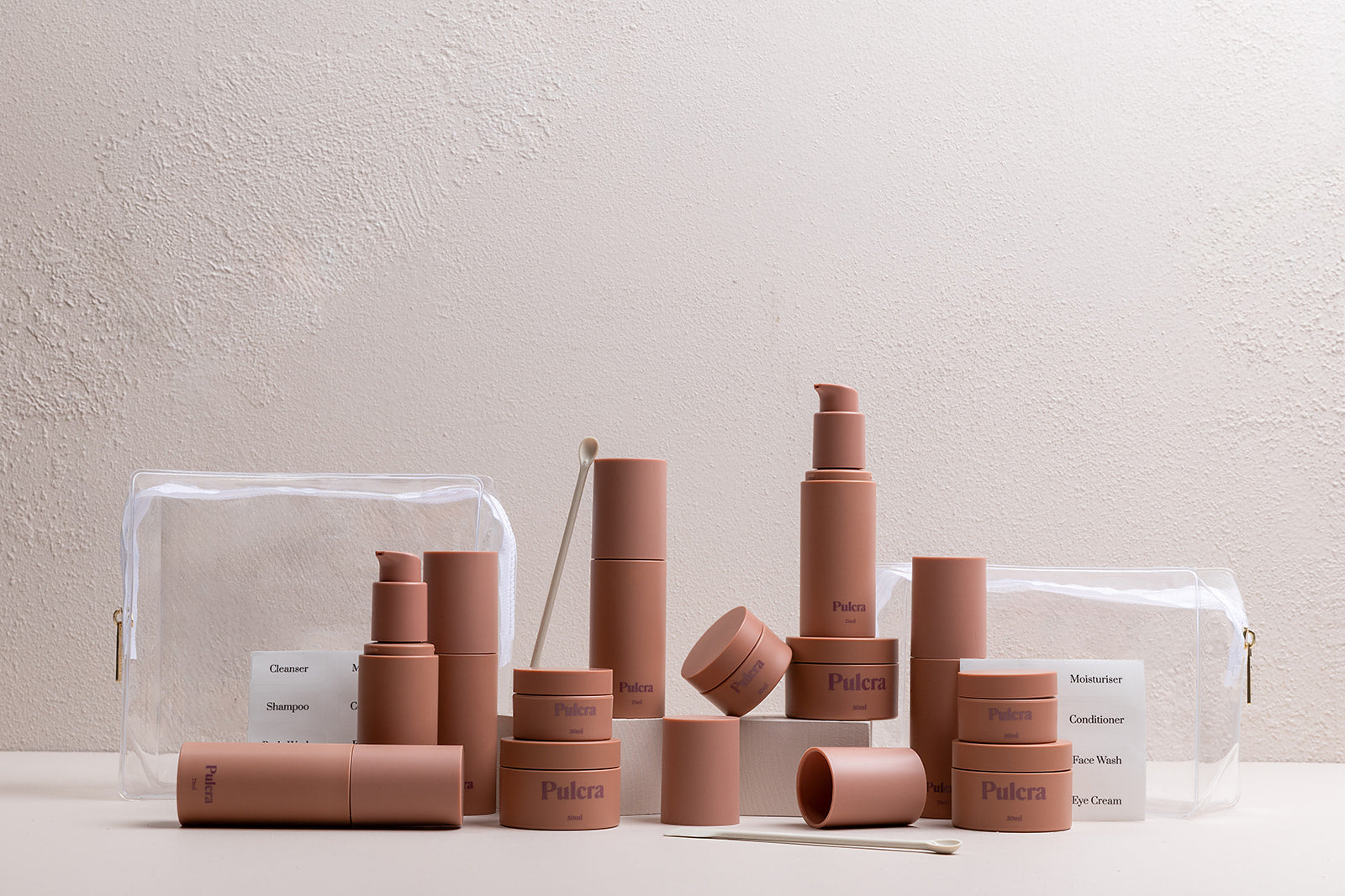 Premium refillable travel set bundle in chocolate, carry-on approved bottles and jars. TSA approved refillable travel containers for beauty and cosmetic products.